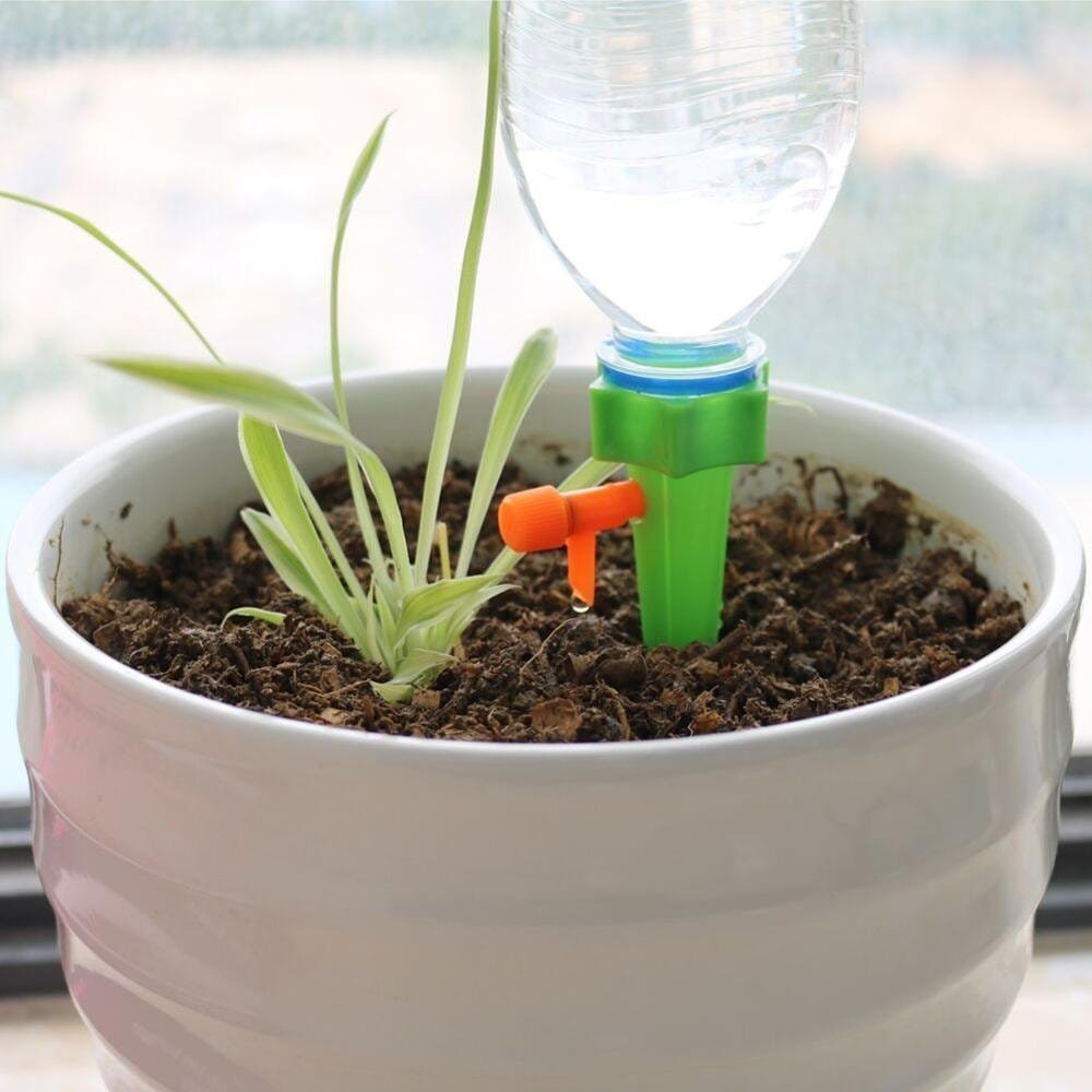 Drip-Irrigation-system-Plant-Waterers-DIY-Automatic-Drip-Water-Spikes-Taper-Watering-Plants-Houseplant-Spike-Dripper-20210310-045137.jpg Automatic Drip Irrigation system Plant Waterers - Image 1